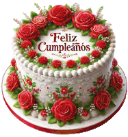 a birthday cake with red roses and the words feliz cumpleanos