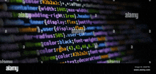 a computer screen is displaying a bunch of code and the word alamy is visible