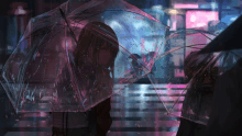 a girl holding a clear umbrella stands in the rain