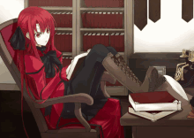 a girl with red hair is reading a book