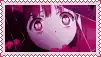 a close up of a girl 's face on a pink background with hearts .