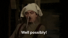 a man with a towel wrapped around his head is saying " well possibly "