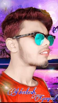 a young man wearing sunglasses and a red shirt with the name nedesh on it