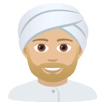 a man with a beard and a white turban is smiling