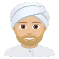 a man with a beard and a white turban is smiling