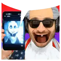 a man wearing sunglasses and headphones is holding up a cell phone