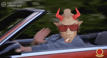 a man with horns and sunglasses is driving a car made by reface app