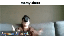 a person wearing a virtual reality headset with the name szymon sobczyk on the bottom right