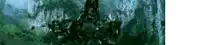 a blurred image of a waterfall in the woods