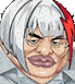 a pixel art drawing of a man with white hair and red streaks .