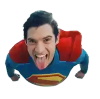 a man in a superman costume with his tongue out