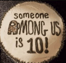 a cake that says " someone among us is 10 " on it