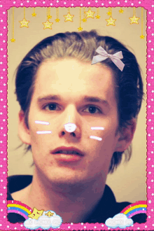 a picture of a man with a bow in his hair is surrounded by a pink border