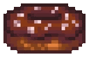 a pixel art illustration of a chocolate donut with sprinkles on it .