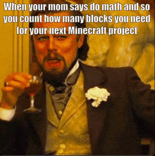 a man in a suit holds a glass of wine and says when your mom says do math and so you count how many blocks