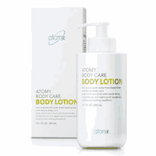 a bottle of atomy body care body lotion sits next to its box