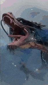 a painting of a dragon swimming in the water with its mouth open