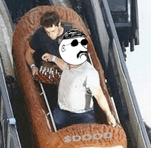 two men are riding a roller coaster with the word dood written on the side