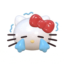 a hello kitty with a red bow is crying