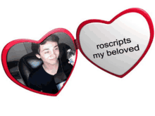 a heart shaped mirror with a picture of a man and the words " rosscripts my beloved "