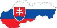 a red white and blue flag with a shield with a cross on it