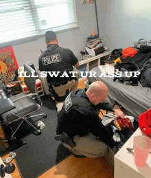 two police officers are kneeling in a messy room