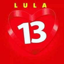 a red heart with the number 13 inside of it on a red background