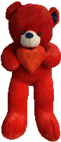 a red teddy bear is holding a heart that says i love