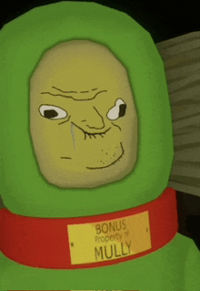 a green cartoon character with a yellow label that says bonus property of mully on it