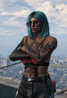 a woman with blue hair and a tattoo on her torso