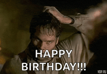 a man is scratching his head and says `` happy birthday ! ''