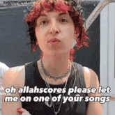 a woman with red hair is making a funny face and says oh allahscores please let me on one of your songs