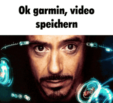 a close up of a man 's face with the words " ok garmin video speichern " above him