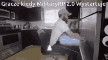 a man is sitting in a chair in a kitchen with the words gracze kiedy military rp 2.0 wystartuje above him