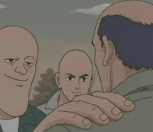 a group of bald men are standing next to each other and talking to each other .