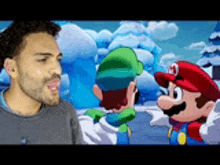 a man with a beard is standing in front of a mario and luigi video game screen .