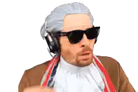 a man wearing a wig and sunglasses has a scarf around his neck