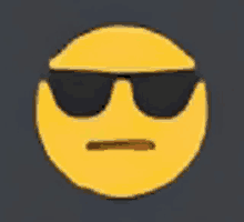 a yellow smiley face with black sunglasses on it .