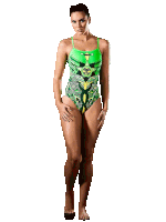 a woman in a green swimsuit is standing on a white surface