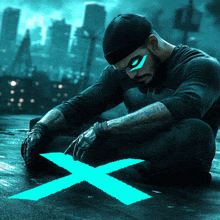 a man in a mask sits on the ground with a blue x on the ground