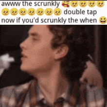 a blurry picture of a man 's face with a caption that says aww