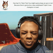 a picture of a man wearing headphones with the caption hey hey it 's tokai teio !