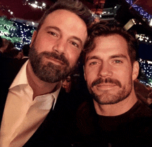 ben affleck and henry cavill pose for a photo