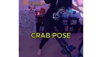 a woman is dancing in a crab pose in front of a microphone in a room .