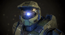 a close up of a video game character 's helmet with a blue light coming out of it