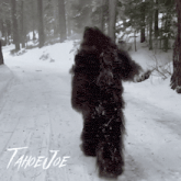 a bigfoot is walking down a snowy path with tahoe joe written below it
