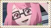 a girl with pink hair and glasses is smiling in a picture frame .