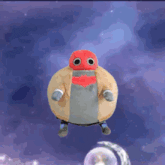 a stuffed animal with a red mask and a bat on it