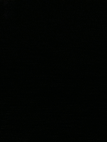 a close up of a black background with a white border .