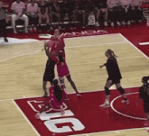 a basketball game is being played on a court with the word big on it